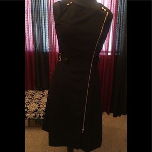 Black dress with gold accents and zipper